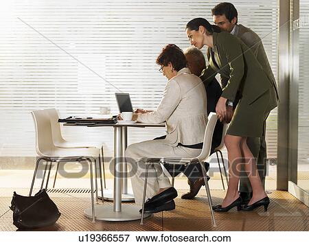 Businesspeople in a restaurant. View Large Photo Image Stock Photo - Businesspeople in a restaurant.. Fotosearch