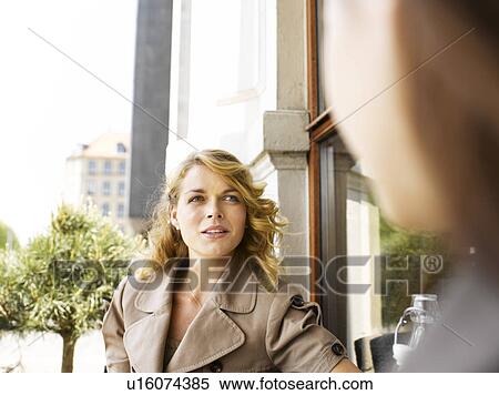Two women at an outdoor restaurant View Large Photo Image Stock Photography - Two women at an outdoor restaurant. Fotosearch