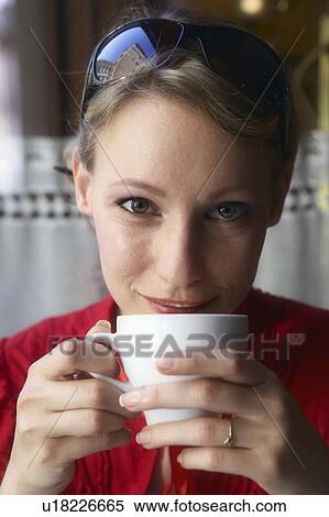 Woman having a cup of coffee. View Large Photo Image Stock Photography - Woman having a cup of coffee.. Fotosearch