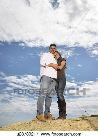 Couple embracing on hilltop, Alicante, Spain, View Large Photo Image Stock Photo - Couple embracing on hilltop, Alicante, Spain,. Fotosearch