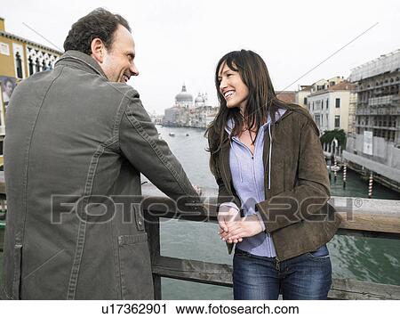 Couple on Academia Bridge. Grand Canal, Venice, Italy. View Large Photo Image Stock Image - Couple on Academia Bridge. Grand Canal, Venice, Italy.. Fotosearch