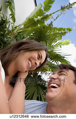 Portrait of a happy couple. View Large Photo Image Stock Photo - Portrait of a happy couple.. Fotosearch