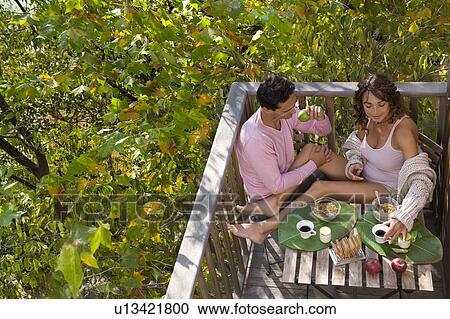 Romantic couple tree house eat. View Large Photo Image Stock Image - Romantic couple tree house eat.. Fotosearch