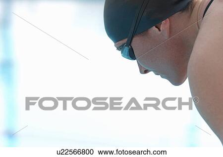 Female swimmer wearing goggles, close-up View Large Photo Image Stock Image - Female swimmer wearing goggles, close-up. Fotosearch