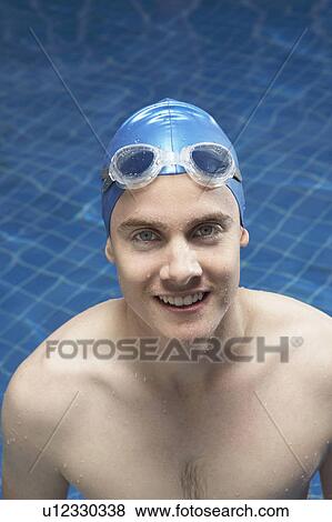 Portrait of a man in a swimming pool. View Large Photo Image Stock Photo - Portrait of a man in a swimming pool.. Fotosearch