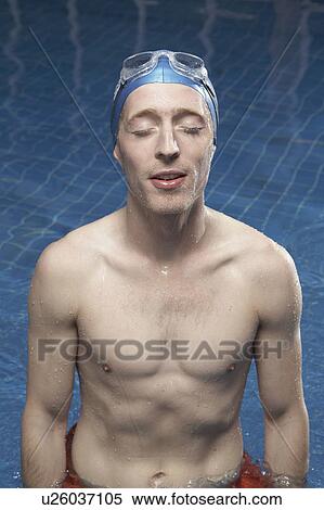 Portrait of a man in a swimming pool. View Large Photo Image Stock Photography - Portrait of a man in a swimming pool.. Fotosearch