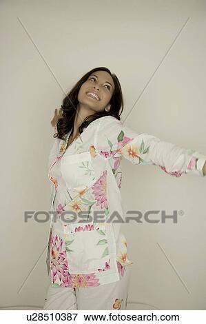Portrait of a woman in pajamas View Large Photo Image Stock Photo - Portrait of a woman in pajamas. Fotosearch
