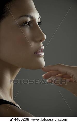 Stock Photo - Side portrait of a woman. Fotosearch