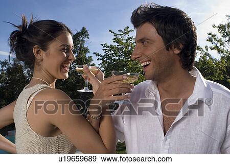 Stock Photo - Couple drinking champagne. Fotosearch