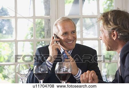Two businessmen having lunch View Large Photo Image Stock Photo - Two businessmen having lunch. Fotosearch