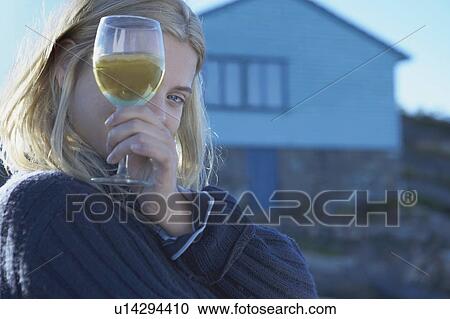 Young Woman relaxing on jetty. View Large Photo Image Stock Image - Young Woman relaxing on jetty.. Fotosearch