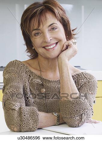 Portrait of senior woman smiling View Large Photo Image Stock Photograph - Portrait of senior woman smiling. Fotosearch