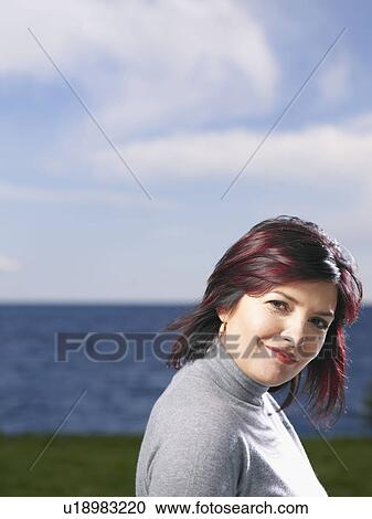 Portrait of woman outdoors View Large Photo Image Stock Image - Portrait of woman outdoors. Fotosearch