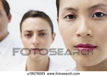 Portrait of woman, people behind View Large Photo Image Stock Image - Portrait of woman, people behind. Fotosearch