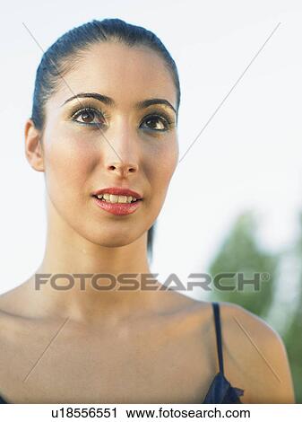 Stock Image - Portrait of young woman. Fotosearch