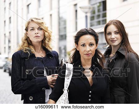 Three women outdoors View Large Photo Image Stock Image - Three women outdoors. Fotosearch