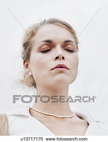 Woman standing outdoors View Large Photo Image Stock Image - Woman standing outdoors . Fotosearch