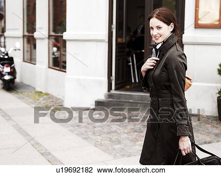 Woman standing outdoors View Large Photo Image Stock Image - Woman standing outdoors . Fotosearch