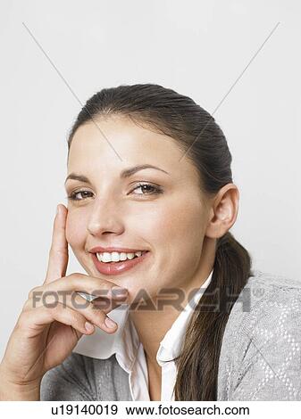 Businesswoman at her desk View Large Photo Image Stock Photo - Businesswoman at her desk. Fotosearch