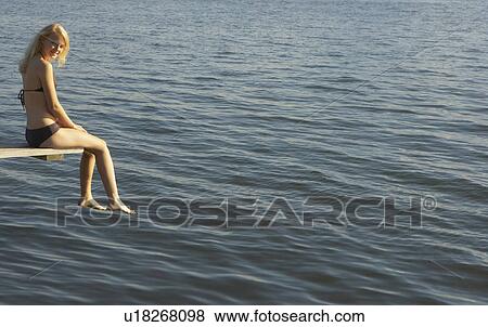 Young woman on diving board. View Large Photo Image Stock Photo - Young woman on diving board.. Fotosearch
