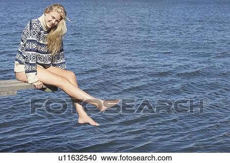 Young woman on diving platform. View Large Photo Image Stock Image - Young woman on diving platform.. Fotosearch