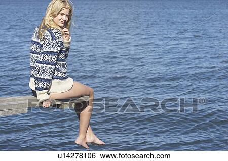 Young woman on diving platform. View Large Photo Image Stock Photograph - Young woman on diving platform.. Fotosearch
