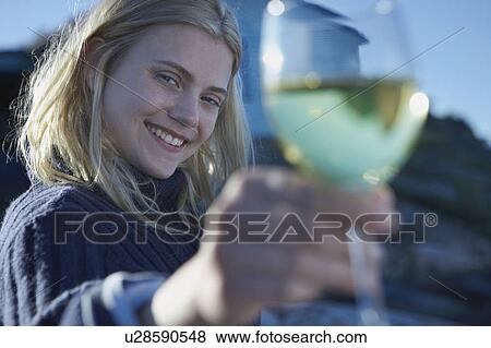 Young Woman relaxing on jetty. View Large Photo Image Stock Photo - Young Woman relaxing on jetty.. Fotosearch