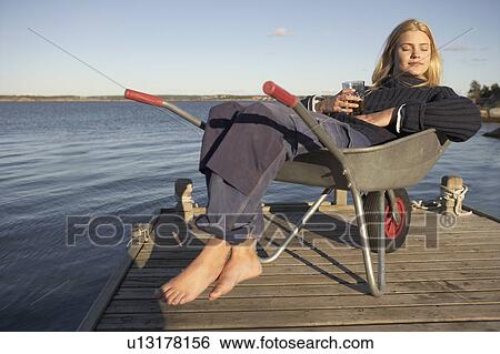 Young Woman relaxing. View Large Photo Image Stock Photograph - Young Woman relaxing.. Fotosearch