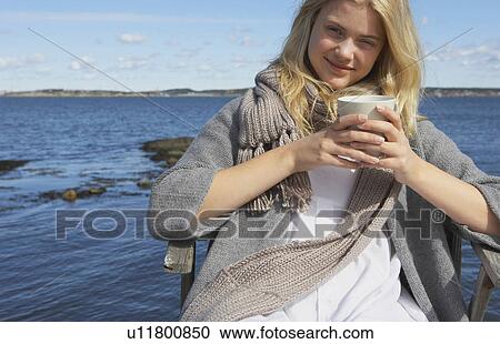 Young Woman drinking Coffee or Tea. View Large Photo Image Stock Image - Young Woman drinking Coffee or Tea.. Fotosearch