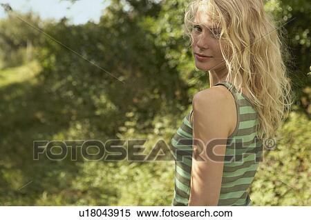 Stock Photography - Young woman in nature.. Fotosearch