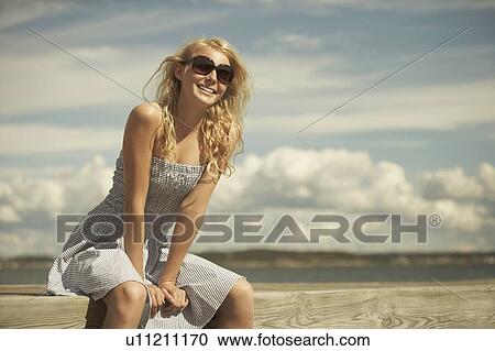 Young Woman in summer dress. View Large Photo Image Stock Image - Young Woman in summer dress.. Fotosearch