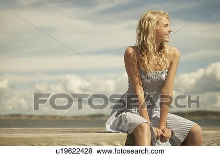 Young Woman in summer dress. View Large Photo Image Stock Photo - Young Woman in summer dress.. Fotosearch