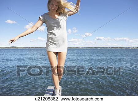 Young woman on diving platform. View Large Photo Image Stock Image - Young woman on diving platform.. Fotosearch