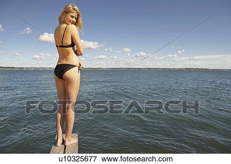 Young woman on diving platform. View Large Photo Image Stock Photo - Young woman on diving platform.. Fotosearch