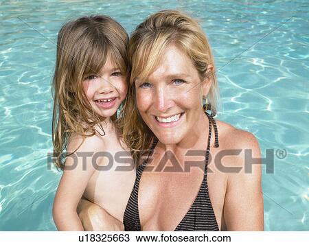 Mother and daughter in pool. View Large Photo Image Stock Image - Mother and daughter in pool.. Fotosearch