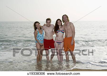 Portrait of a group of four friends. View Large Photo Image Stock Photograph - Portrait of a group of four friends.. Fotosearch