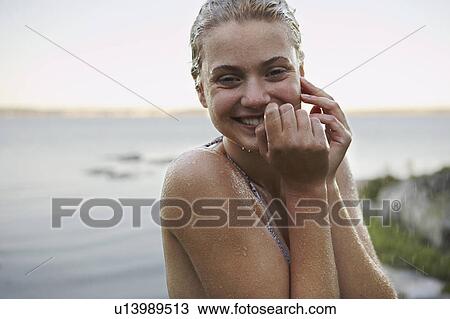 Young Woman in rain wearing bikini. View Large Photo Image Stock Image - Young Woman in rain wearing bikini.. Fotosearch