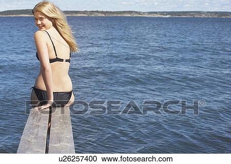 Young woman on diving platform. View Large Photo Image Stock Image - Young woman on diving platform.. Fotosearch