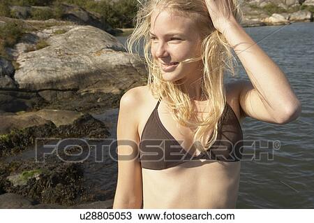 Young Woman by sea. View Large Photo Image Stock Image - Young Woman by sea.. Fotosearch