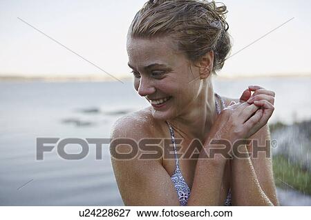 Young Woman in rain wearing bikini. View Large Photo Image Stock Photo - Young Woman in rain wearing bikini.. Fotosearch