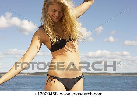 Young woman on diving platform. View Large Photo Image Stock Photo - Young woman on diving platform.. Fotosearch