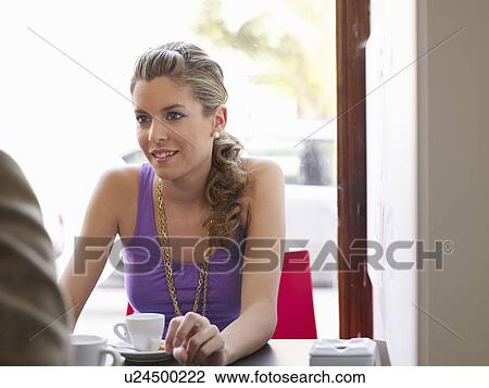 Stock Image - Female teen in cafe. Fotosearch