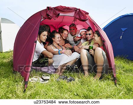 Group of people in tent View Large Photo Image Picture - Group of people in tent. Fotosearch