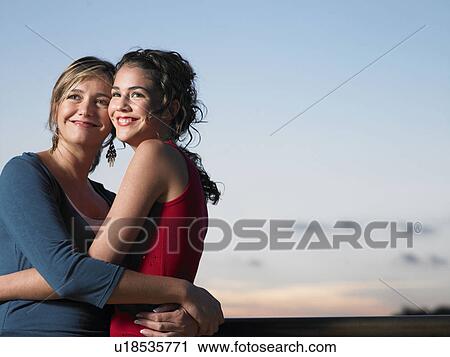 Portrait of mother and daughter View Large Photo Image Stock Image - Portrait of mother and daughter. Fotosearch