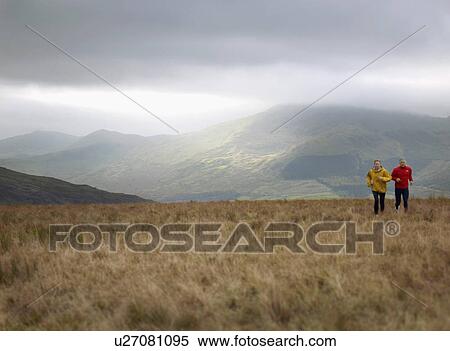 Stock Photography - Couple running.. Fotosearch