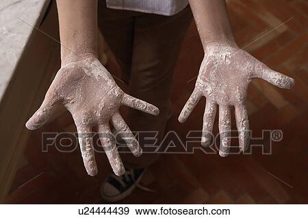 Girls (9-11) hands covered with flour, close-up View Large Photo Image Stock Photo - Girls (9-11) hands covered with flour, close-up. Fotosearch