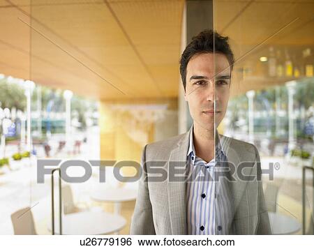 Man half in half out a doorway. View Large Photo Image Stock Photograph - Man half in half out a doorway.. Fotosearch