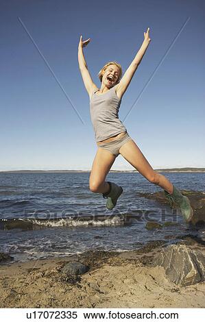Young Woman in Wellingtons. View Large Photo Image Stock Photography - Young Woman in Wellingtons.. Fotosearch
