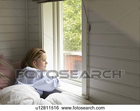 Businesswoman in bed at home View Large Photo Image Stock Photograph - Businesswoman in bed at home. Fotosearch