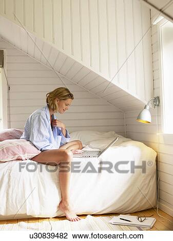 Businesswoman working from home View Large Photo Image Stock Image - Businesswoman working from home. Fotosearch